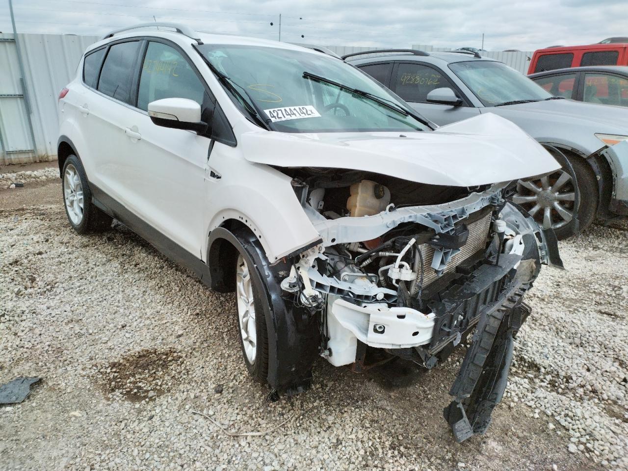 FORD ESCAPE TIT 2015 with VIN 1FMCU0J94FUA04743 - Photo from auction