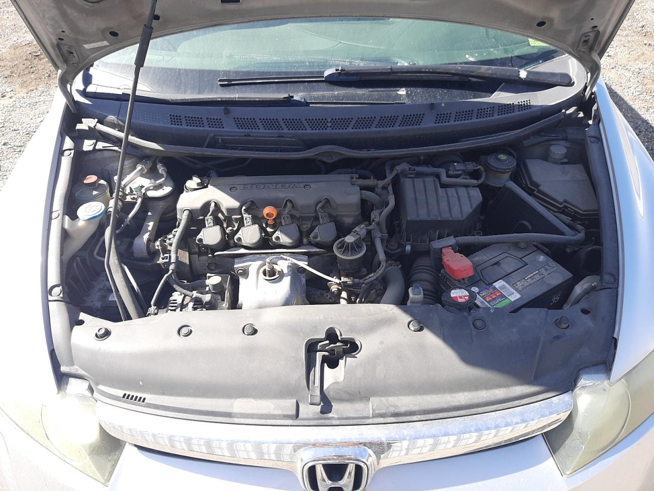 Photo 7 from auction – 2007 HONDA CIVIC LX with VIN 2HGFA15557H503404