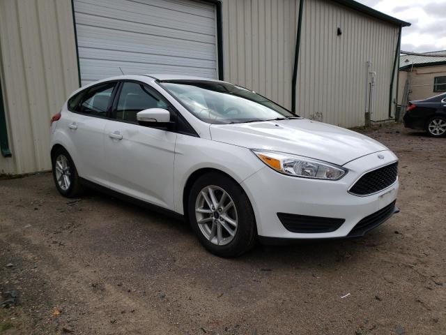 FORD FOCUS SE 2016 with VIN 1FADP3K20GL297458 - Photo from auction