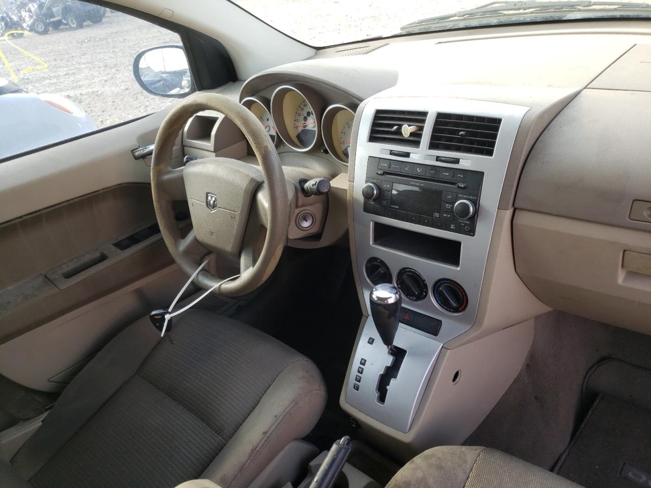 Photo 9 from auction – 2009 DODGE CALIBER SX with VIN 1B3HB48A49D171360