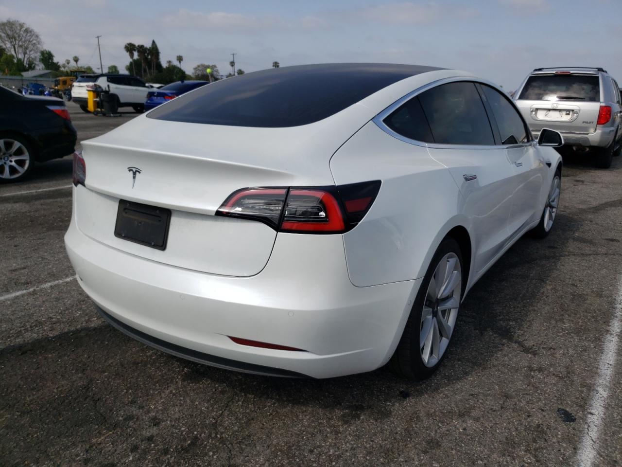 Photo 4 from auction – 2020 TESLA MODEL 3 with VIN 5YJ3E1EA3LF744087