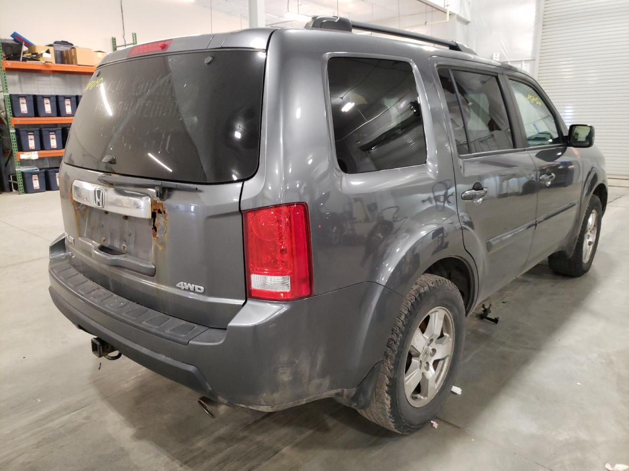 Photo 4 from auction – 2011 HONDA PILOT EXL with VIN 5FNYF4H52BB042859
