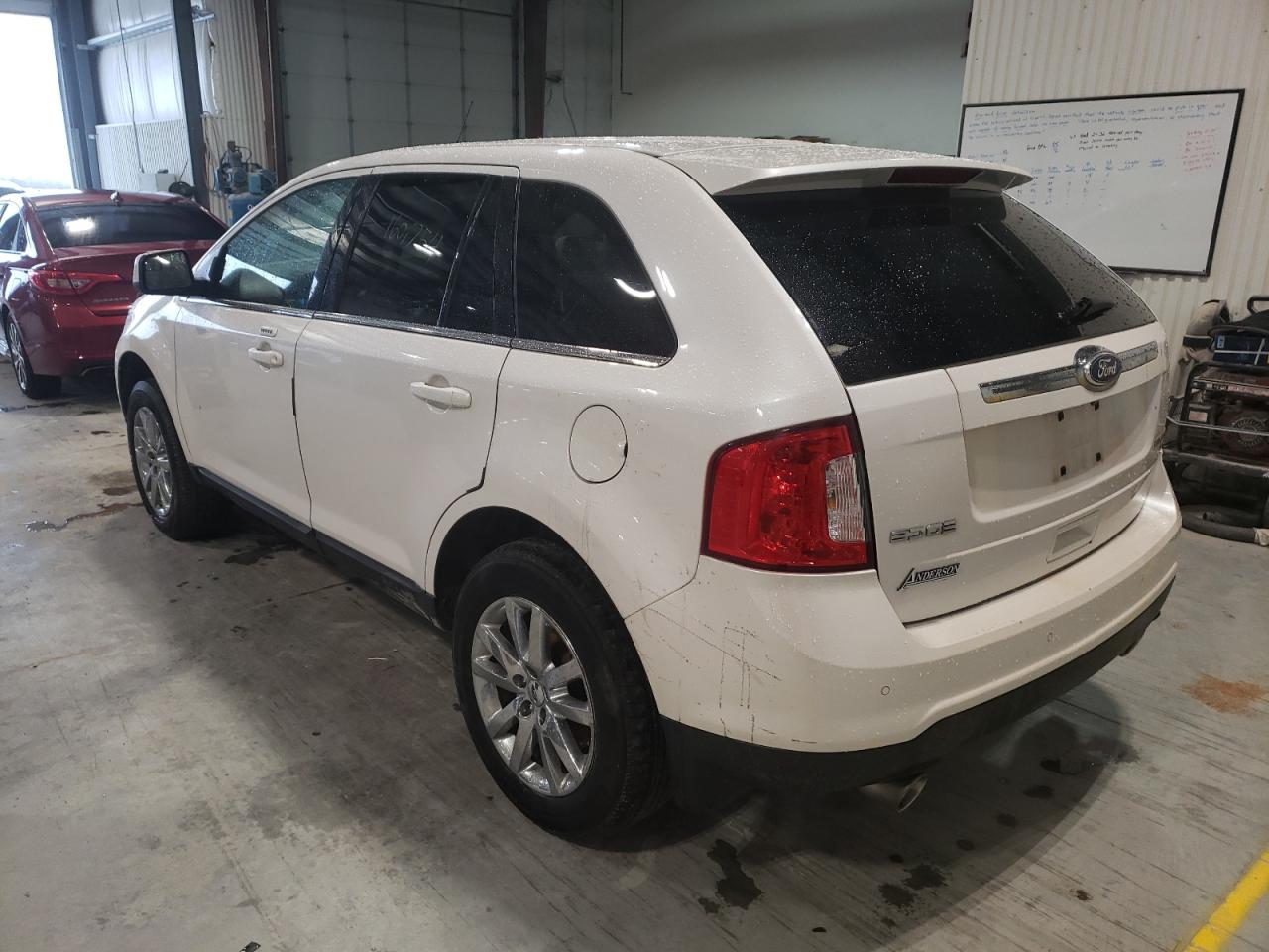 Photo 3 from auction – 2011 FORD EDGE LIMIT with VIN 2FMDK4KC0BBA57788