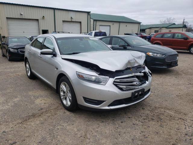 FORD TAURUS SEL 2014 with VIN 1FAHP2H82EG141354 - Photo from auction