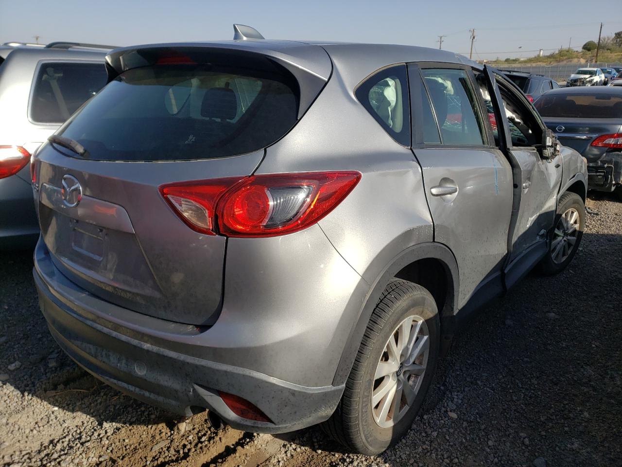 Photo 4 from auction – 2014 MAZDA CX-5 SPORT with VIN JM3KE2BE7E0328593