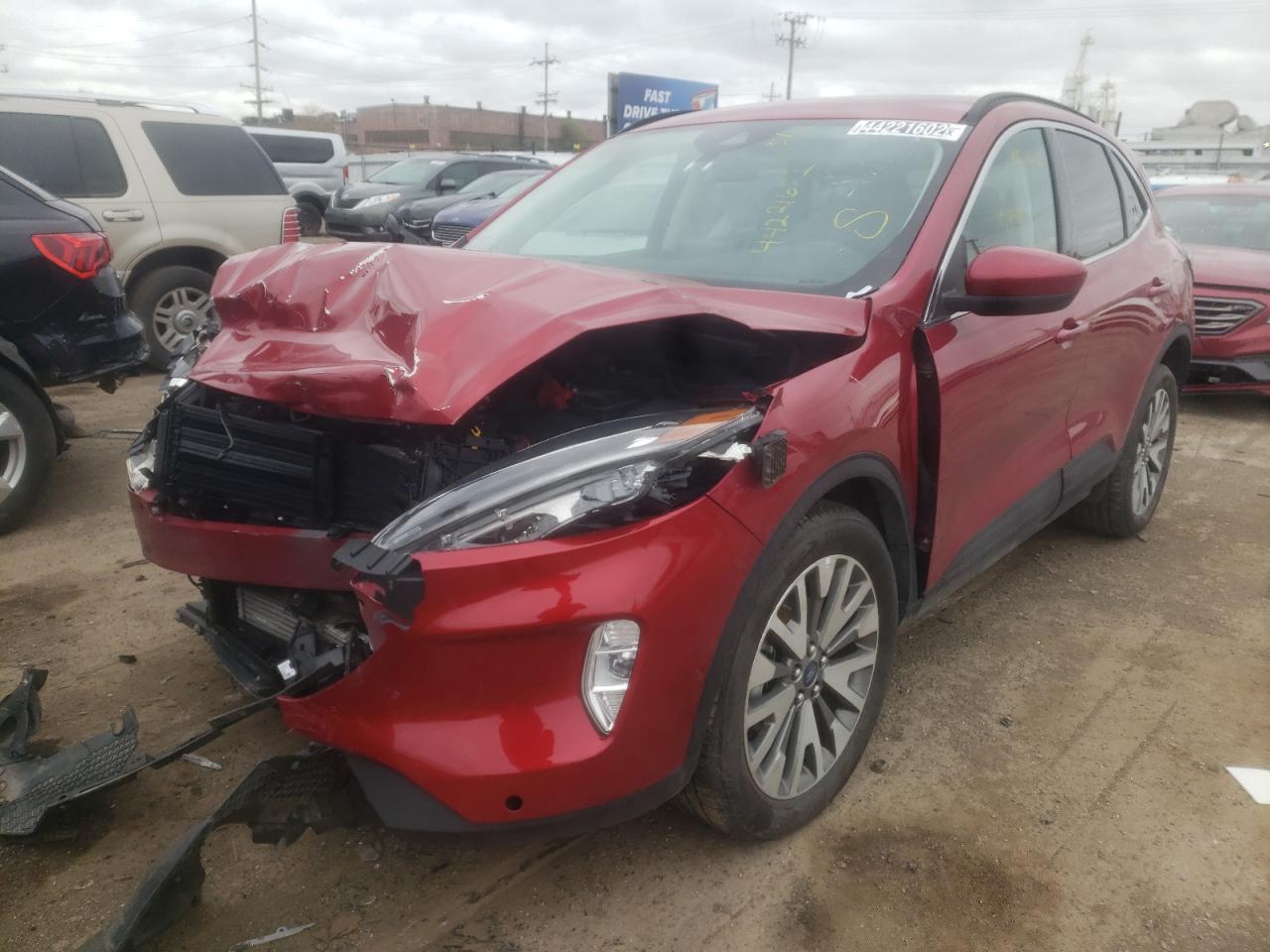 Photo 2 from auction – 2021 FORD ESCAPE TIT with VIN 1FMCU9J98MUA58029