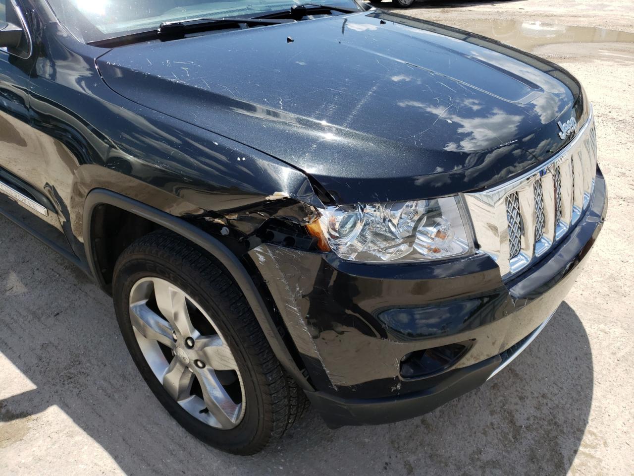 Photo 9 from auction – 2012 JEEP GRAND CHER with VIN 1C4RJFCG9CC140289