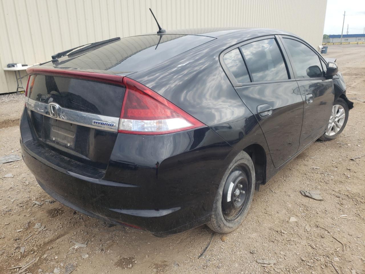 Photo 4 from auction – 2012 HONDA INSIGHT EX with VIN JHMZE2H74CS002573