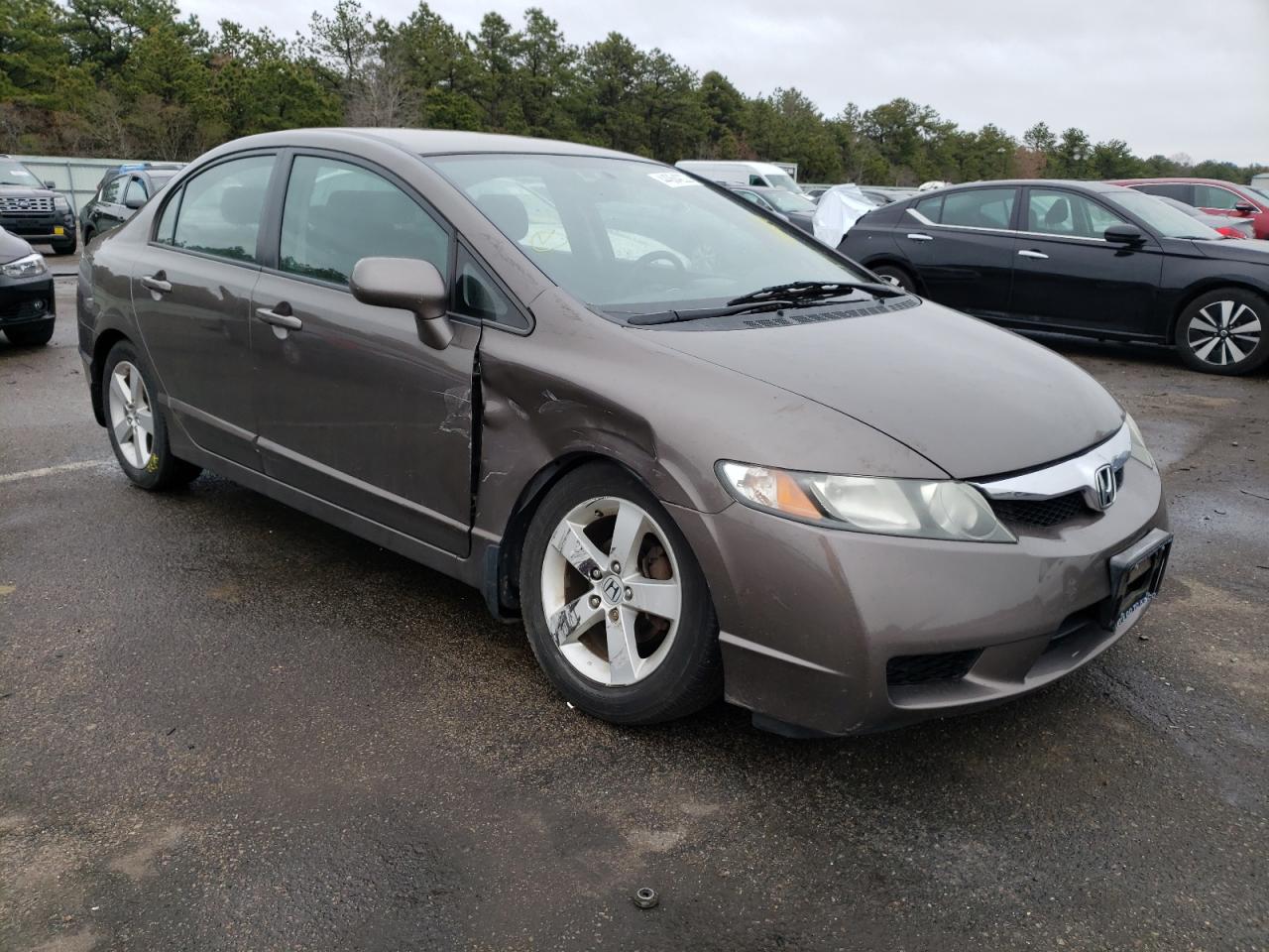 HONDA CIVIC LX-S 2011 with VIN 2HGFA1F63BH537843 - Photo from auction