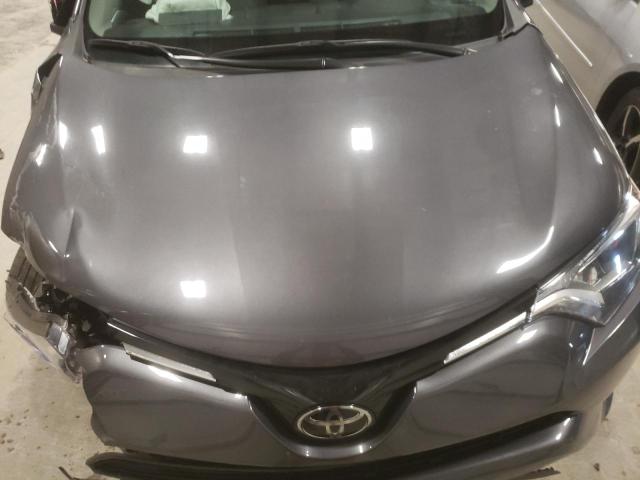 Photo 7 from auction – 2018 TOYOTA RAV4 LE with VIN 2T3ZFREV2JW506005