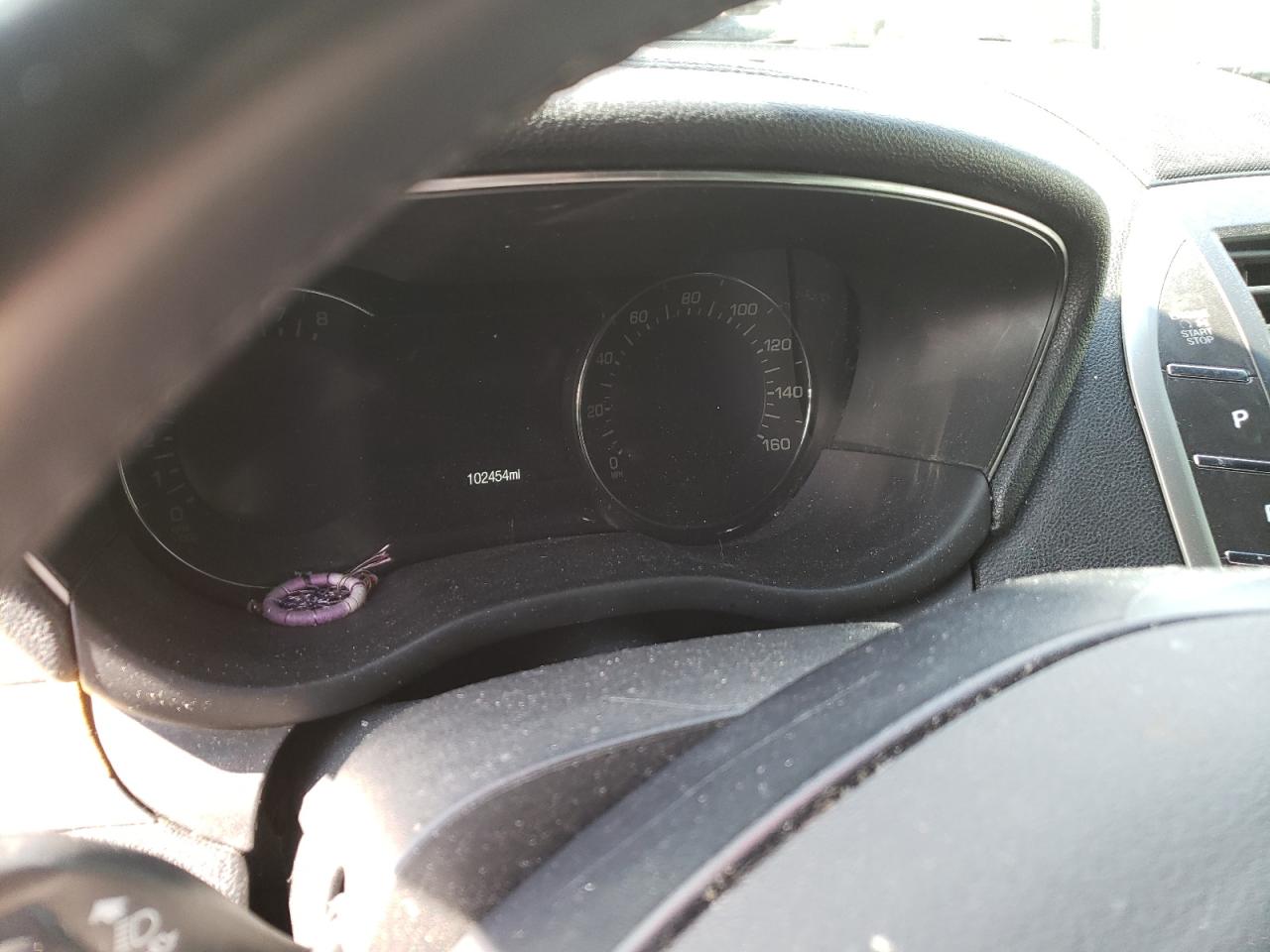 Photo 13 from auction – 2015 LINCOLN MKC with VIN 5LMCJ2A95FUJ07221