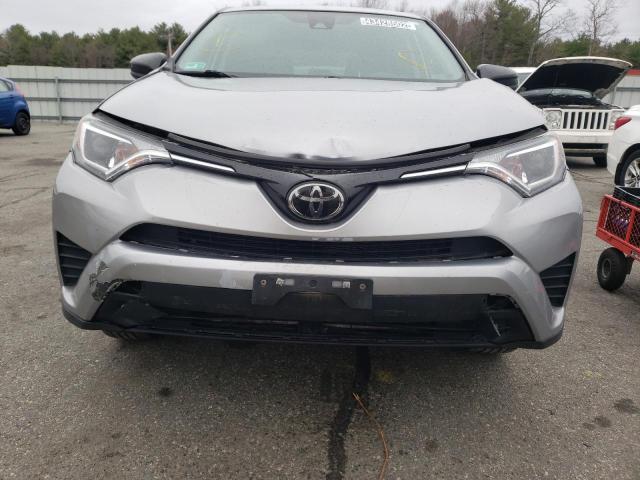 Photo 9 from auction – 2018 TOYOTA RAV4 LE with VIN 2T3BFREV7JW711806