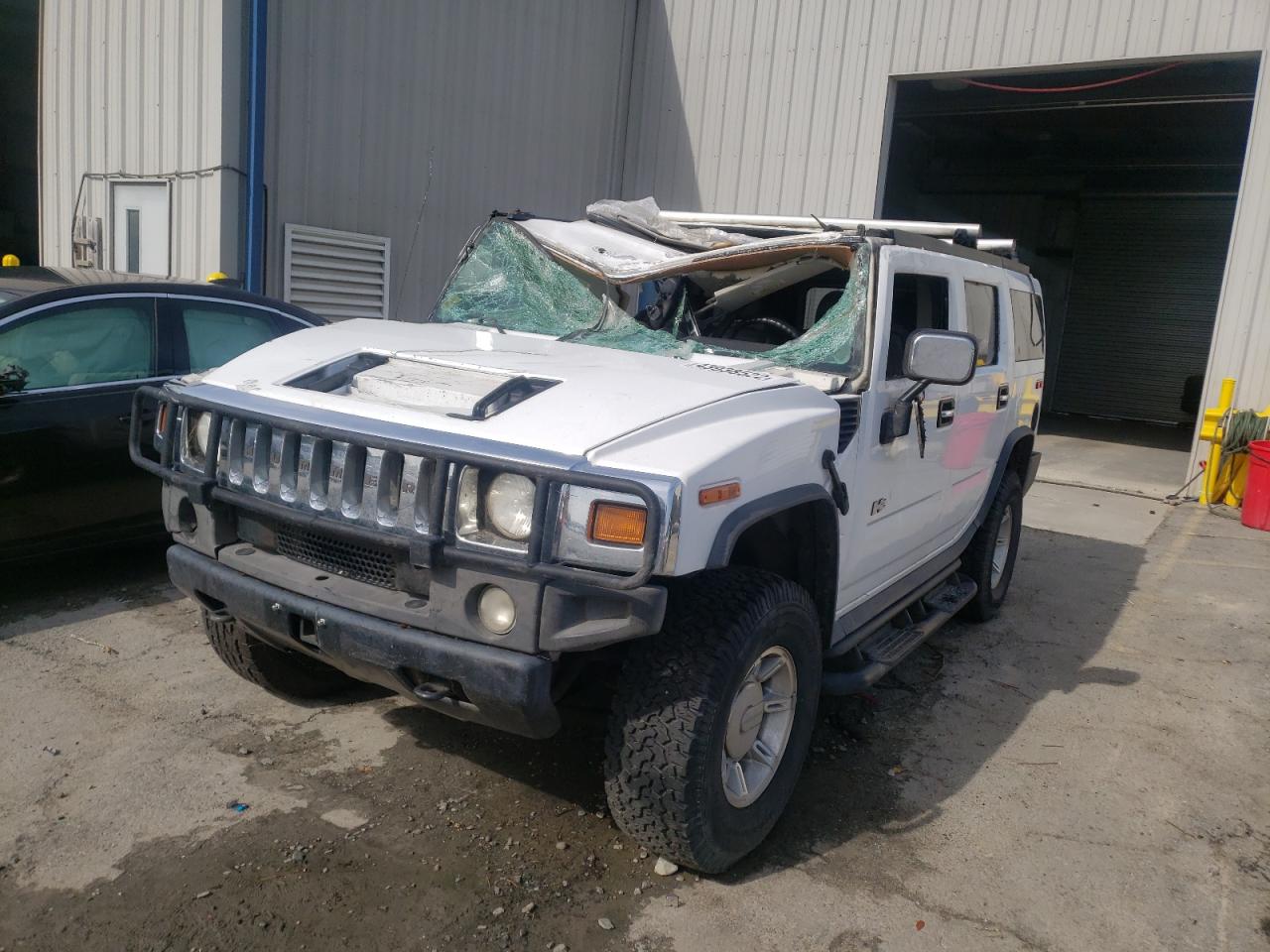 Photo 2 from auction – 2004 HUMMER H2 with VIN 5GRGN23UX4H113826