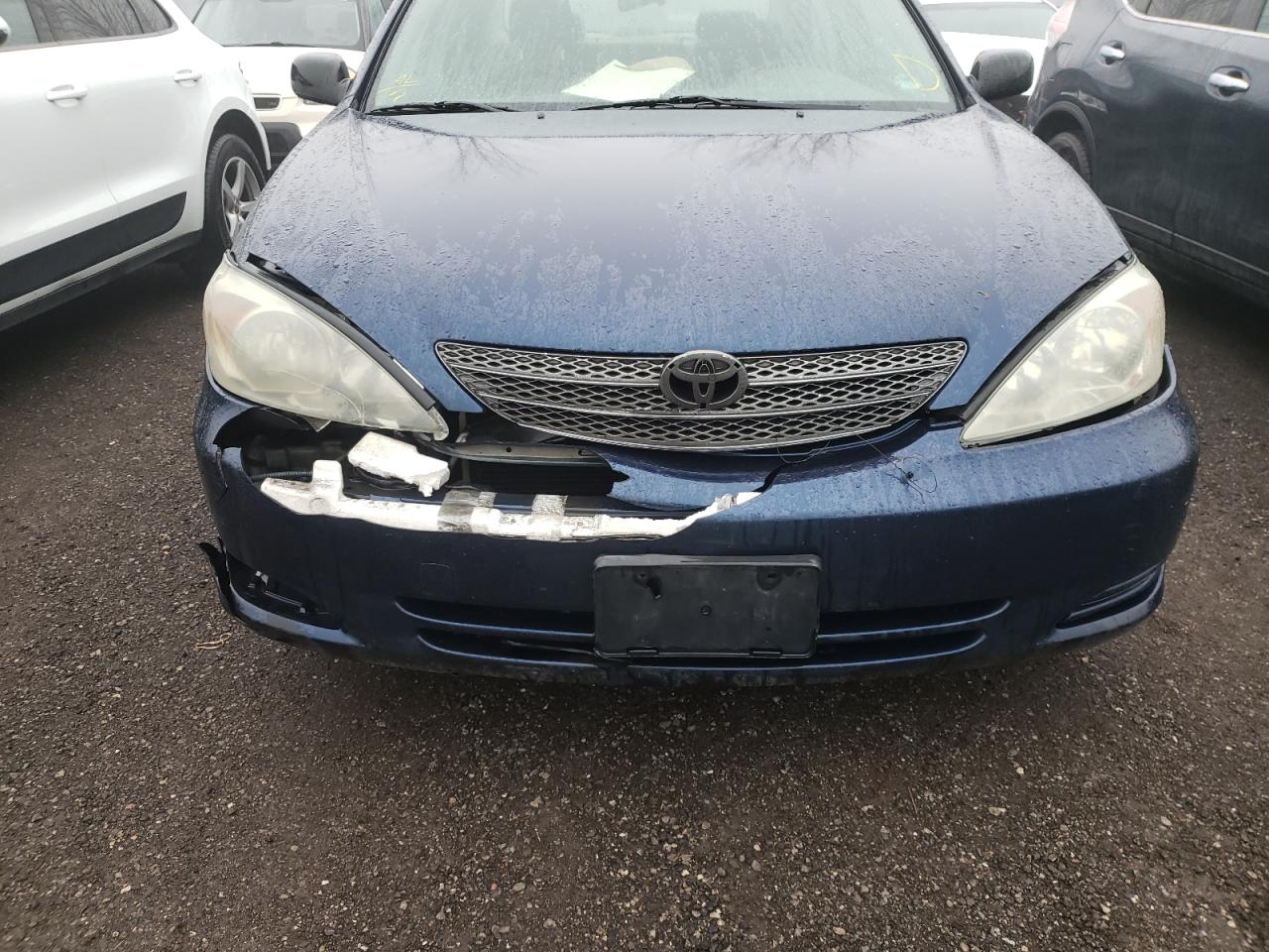 Photo 9 from auction – 2003 TOYOTA CAMRY LE with VIN JTDBF32K530120209