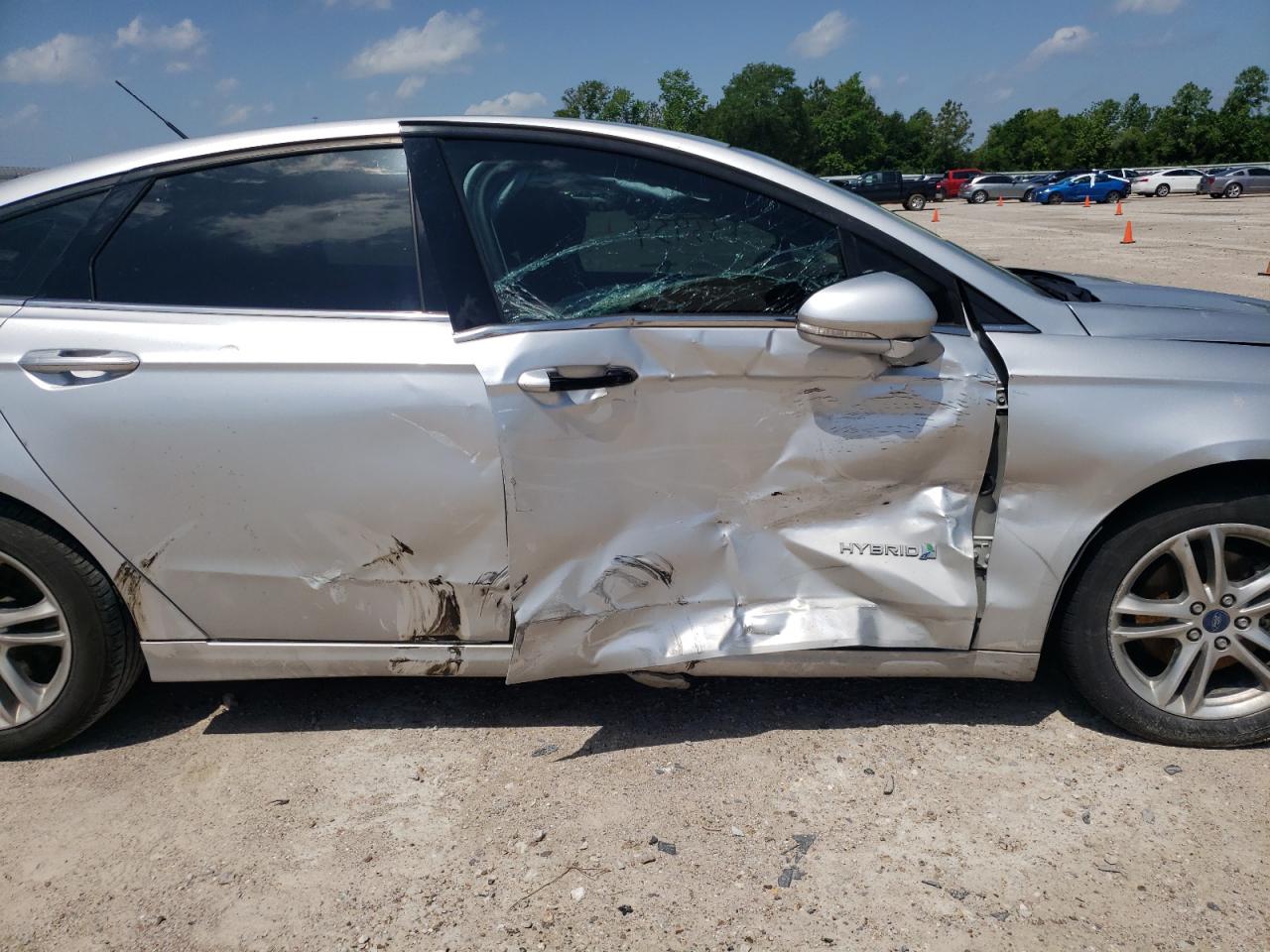 Photo 9 from auction – 2016 FORD FUSION HYB with VIN 3FA6P0LU9GR248123