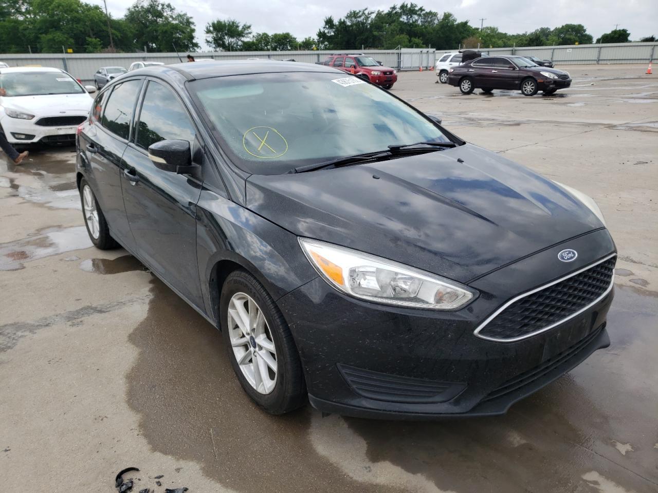 FORD FOCUS SE 2016 with VIN 1FADP3K21GL244767 - Photo from auction