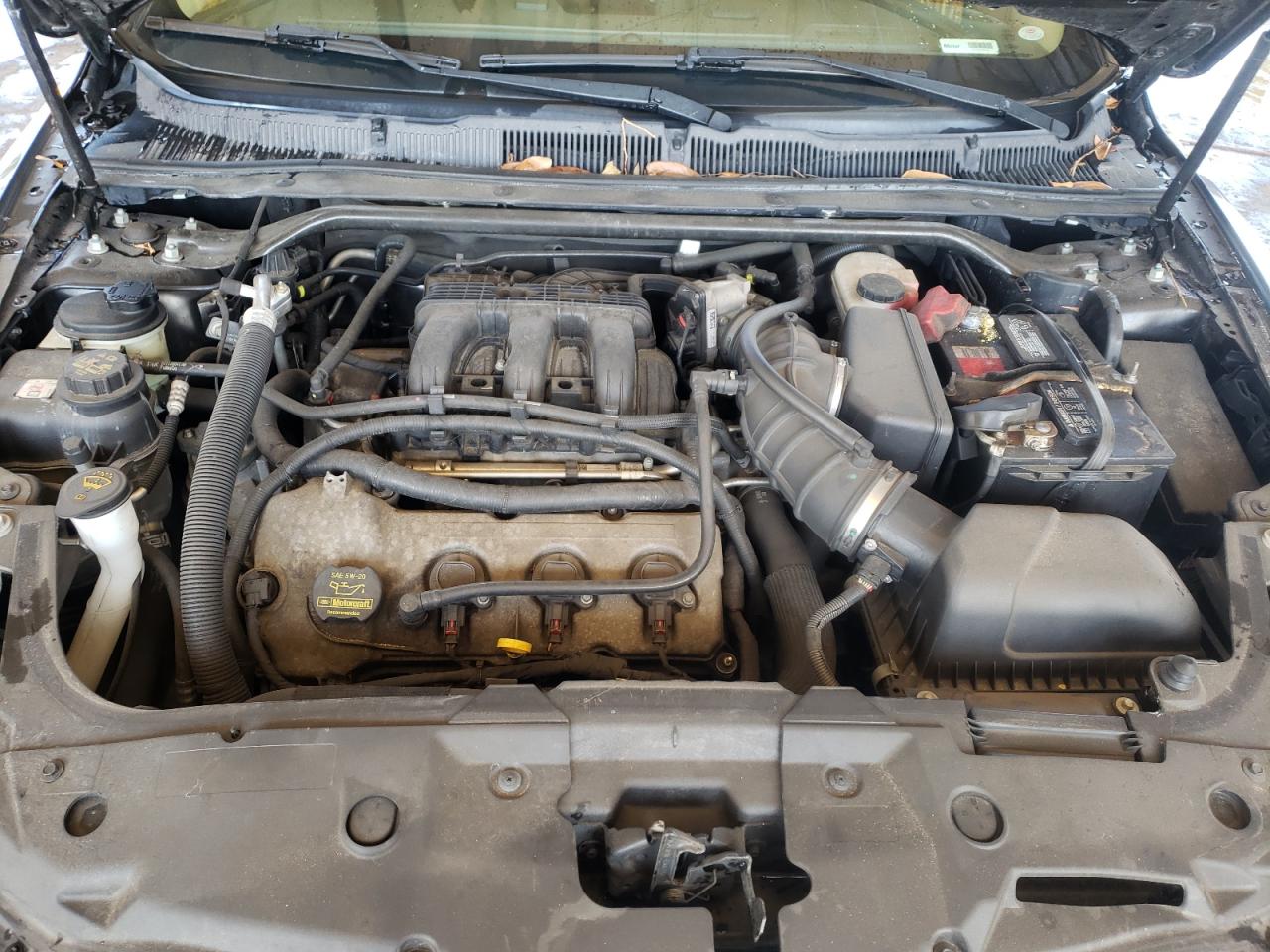 Photo 7 from auction – 2011 FORD TAURUS LIM with VIN 1FAHP2FW5BG133696