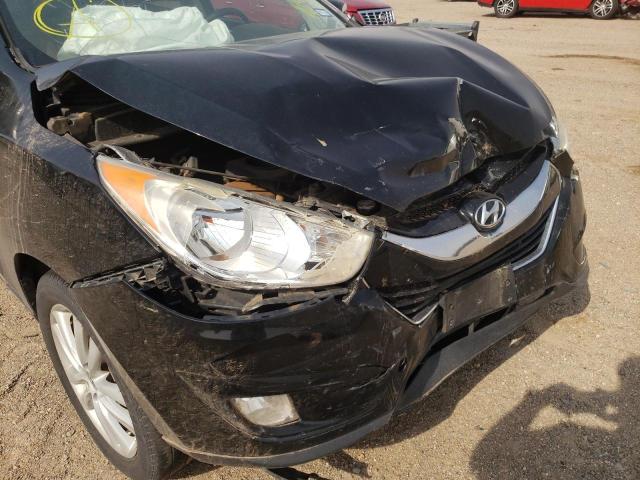 Photo 9 from auction – 2010 HYUNDAI TUCSON GLS with VIN KM8JUCAC8AU021512