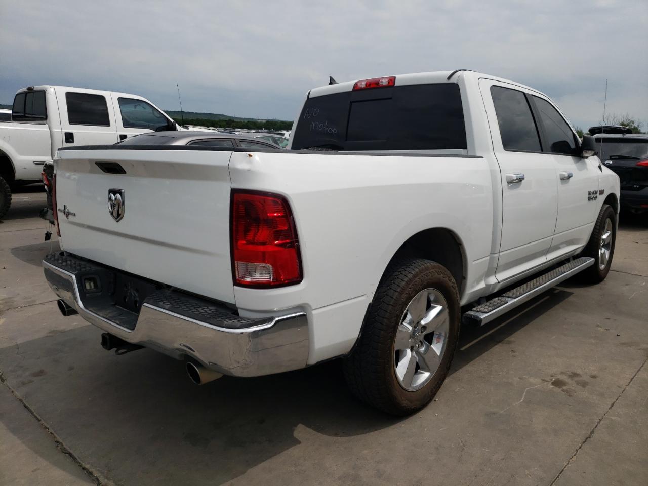 Photo 4 from auction – 2014 RAM 1500 SLT with VIN 1C6RR6LT5ES205659