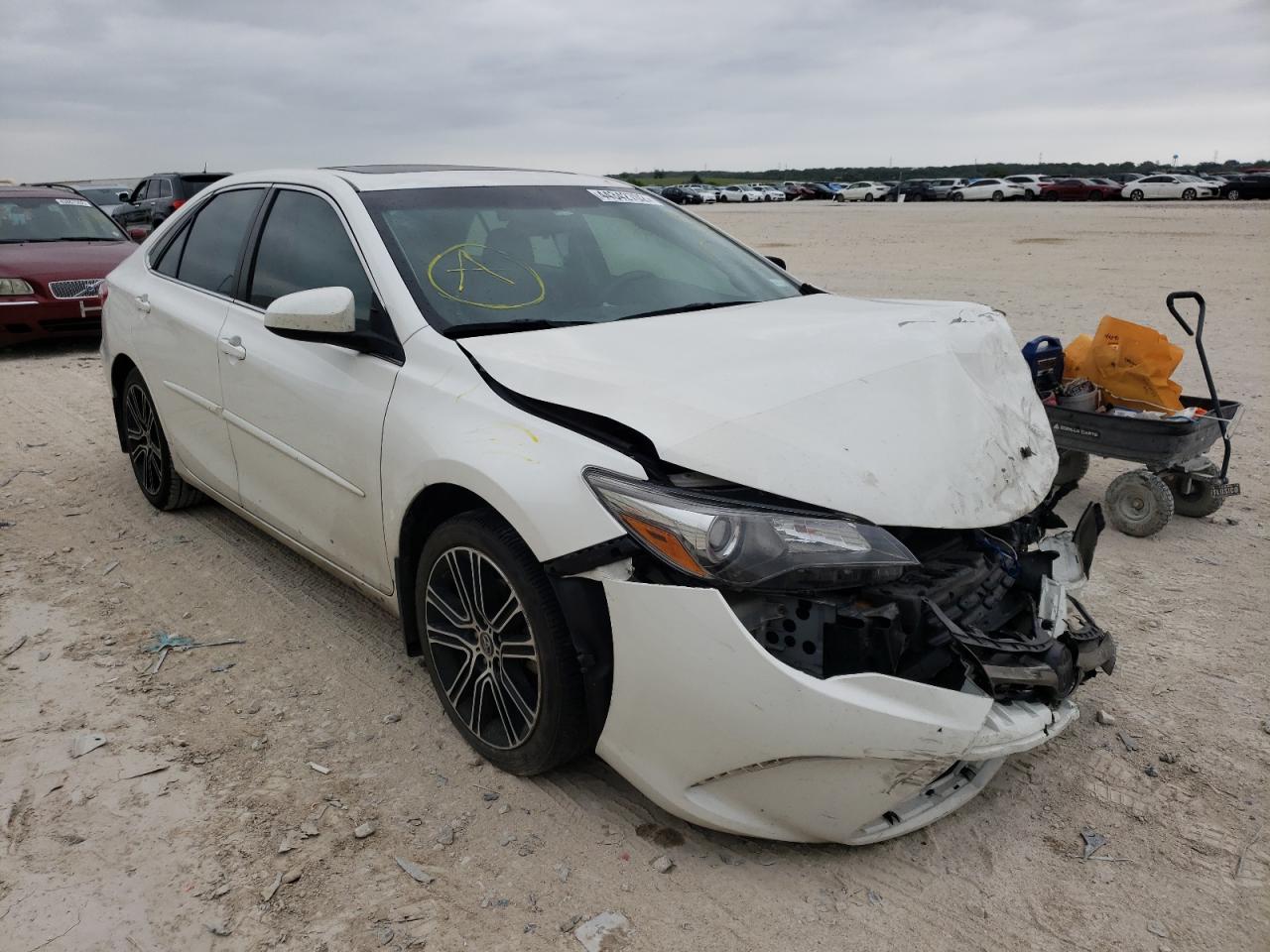 TOYOTA CAMRY LE 2016 with VIN 4T1BF1FKXGU177112 - Photo from auction