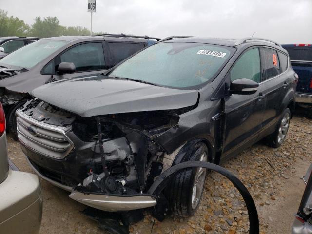 Photo 2 from auction – 2017 FORD ESCAPE TIT with VIN 1FMCU9J91HUD28272
