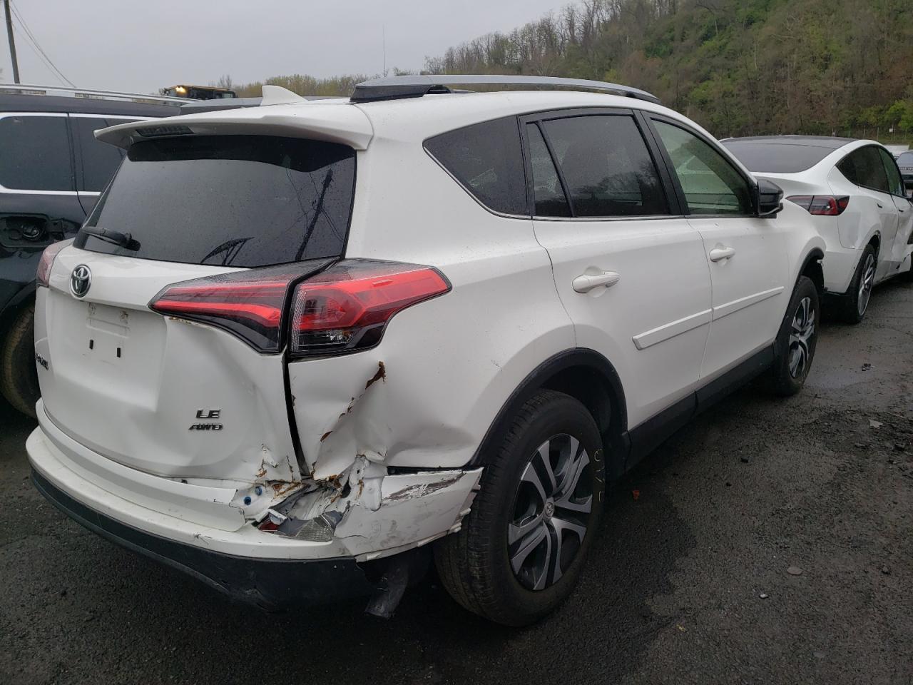 Photo 4 from auction – 2018 TOYOTA RAV4 LE with VIN JTMBFREV9JJ222953
