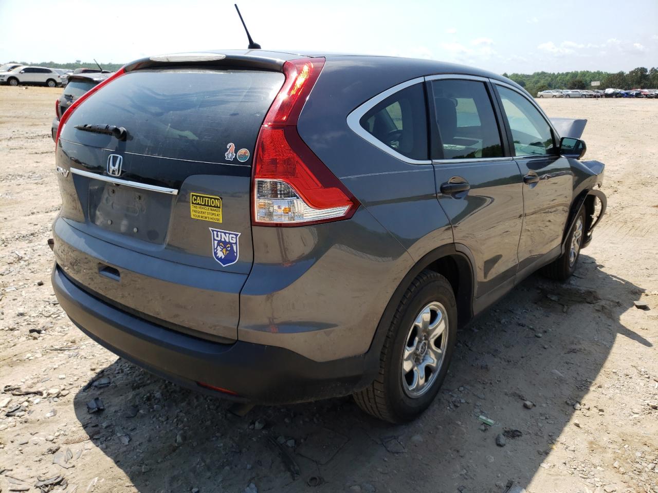 Photo 4 from auction – 2014 HONDA CR-V LX with VIN 3CZRM3H33EG715315