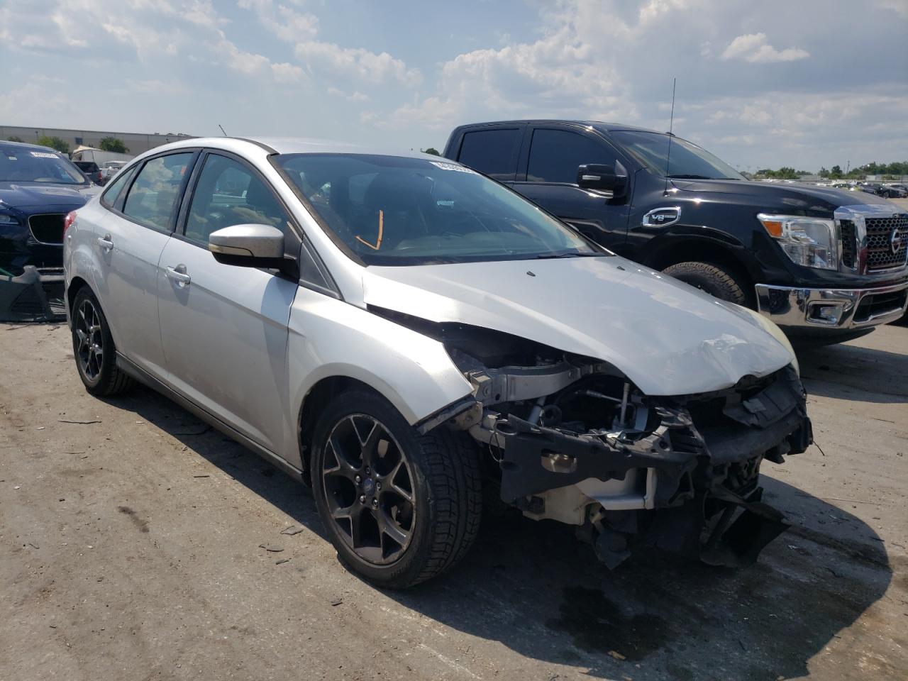 FORD FOCUS SE 2013 with VIN 1FADP3F21DL312040 - Photo from auction