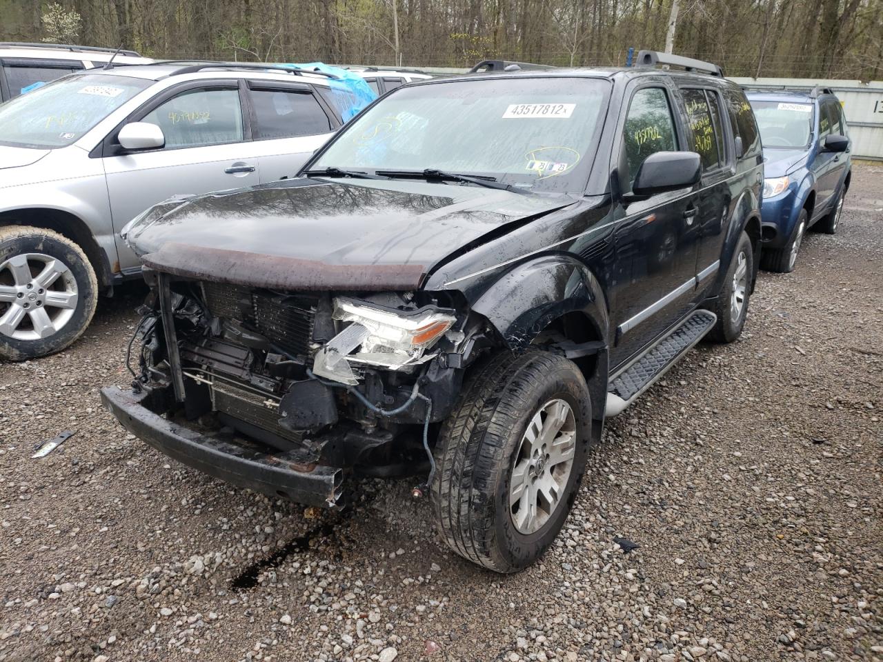 Photo 2 from auction – 2011 NISSAN PATHFINDER with VIN 5N1AR1NB1BC624297