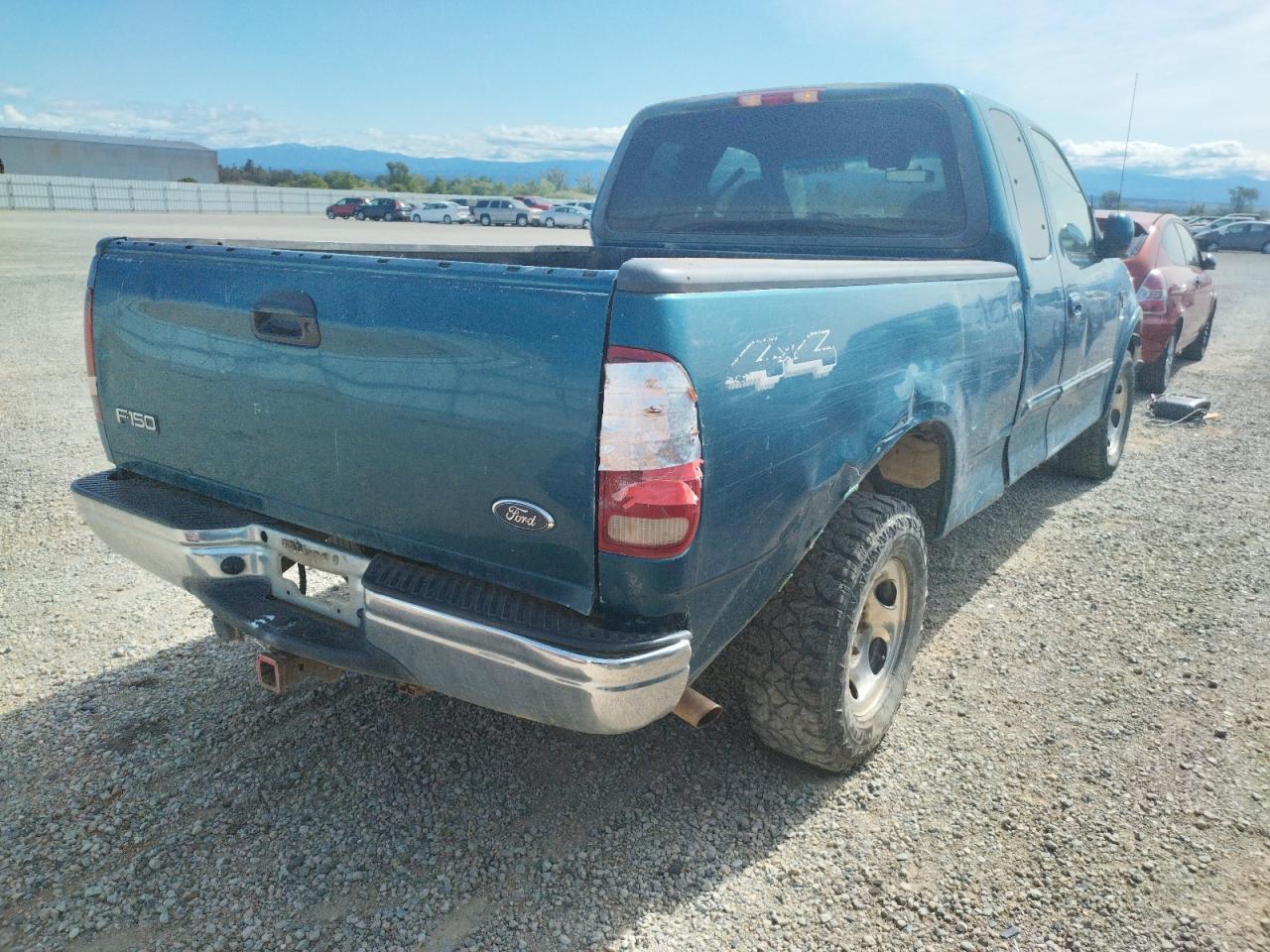 Photo 4 from auction – 2000 FORD F150 with VIN 2FTRX18L5YCB11607