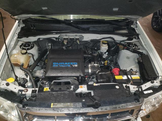 Photo 7 from auction – 2009 FORD ESCAPE LIM with VIN 1FMCU04G79KC31421