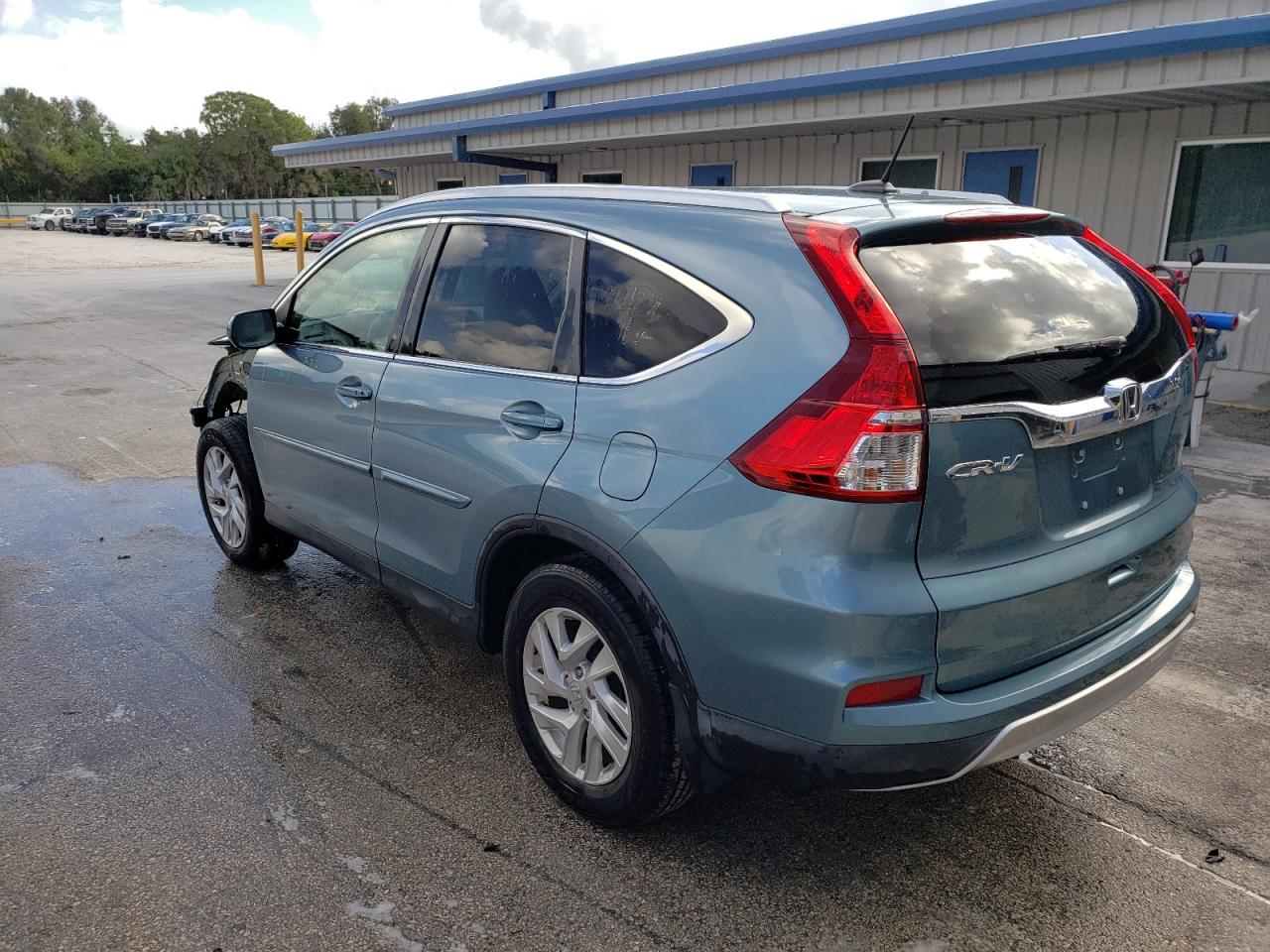 Photo 3 from auction – 2016 HONDA CR-V EXL with VIN 2HKRM3H70GH530612