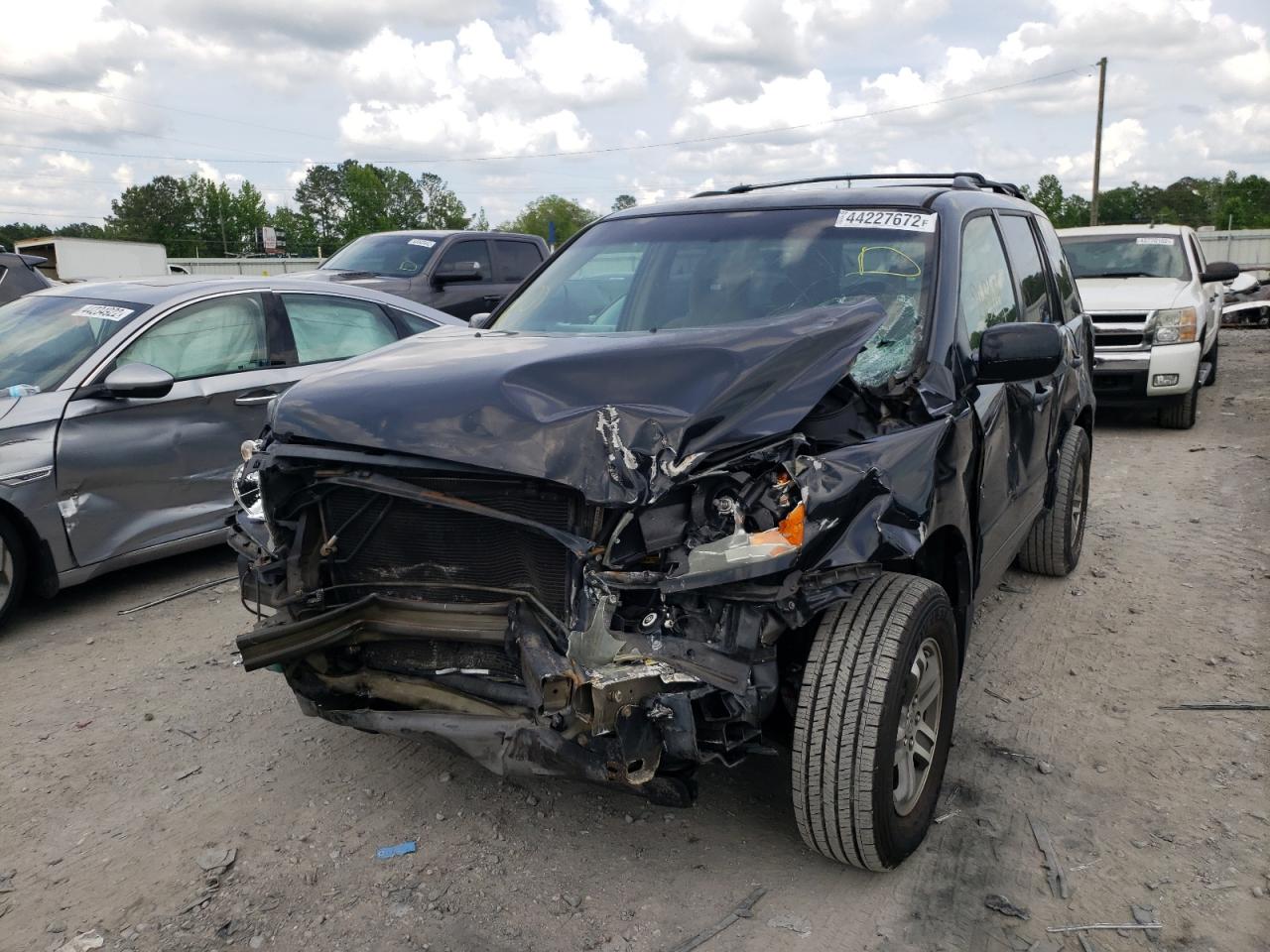 Photo 2 from auction – 2005 HONDA PILOT EX with VIN 5FNYF18405B055751