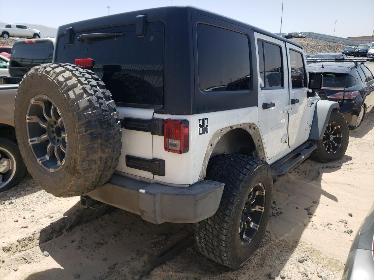 Photo 4 from auction – 2013 JEEP WRANGLER U with VIN 1C4BJWFG0DL599595