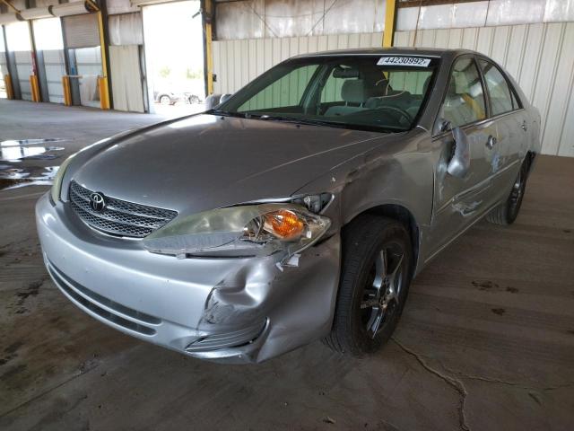 Photo 2 from auction – 2004 TOYOTA CAMRY LE with VIN JTDBE32K640254991