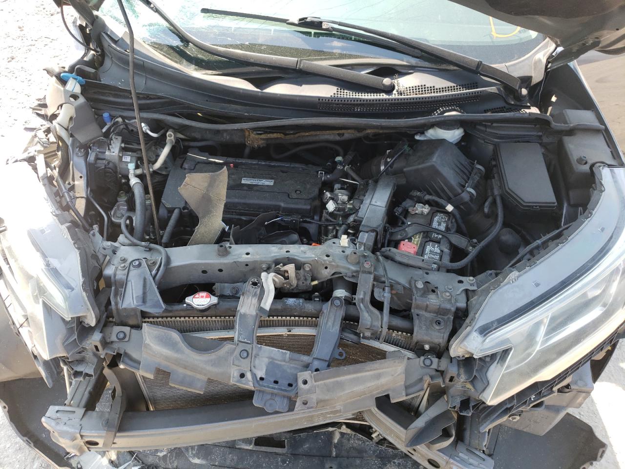 Photo 7 from auction – 2016 HONDA CR-V LX with VIN 2HKRM3H30GH540828