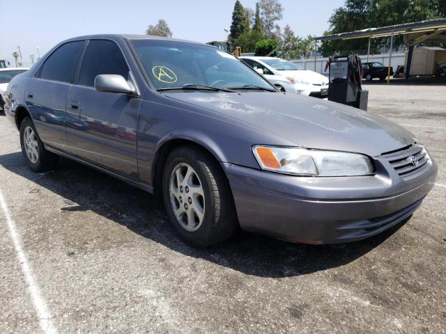 TOYOTA CAMRY LE 1999 with VIN JT2BF22K4X0174335 - Photo from auction