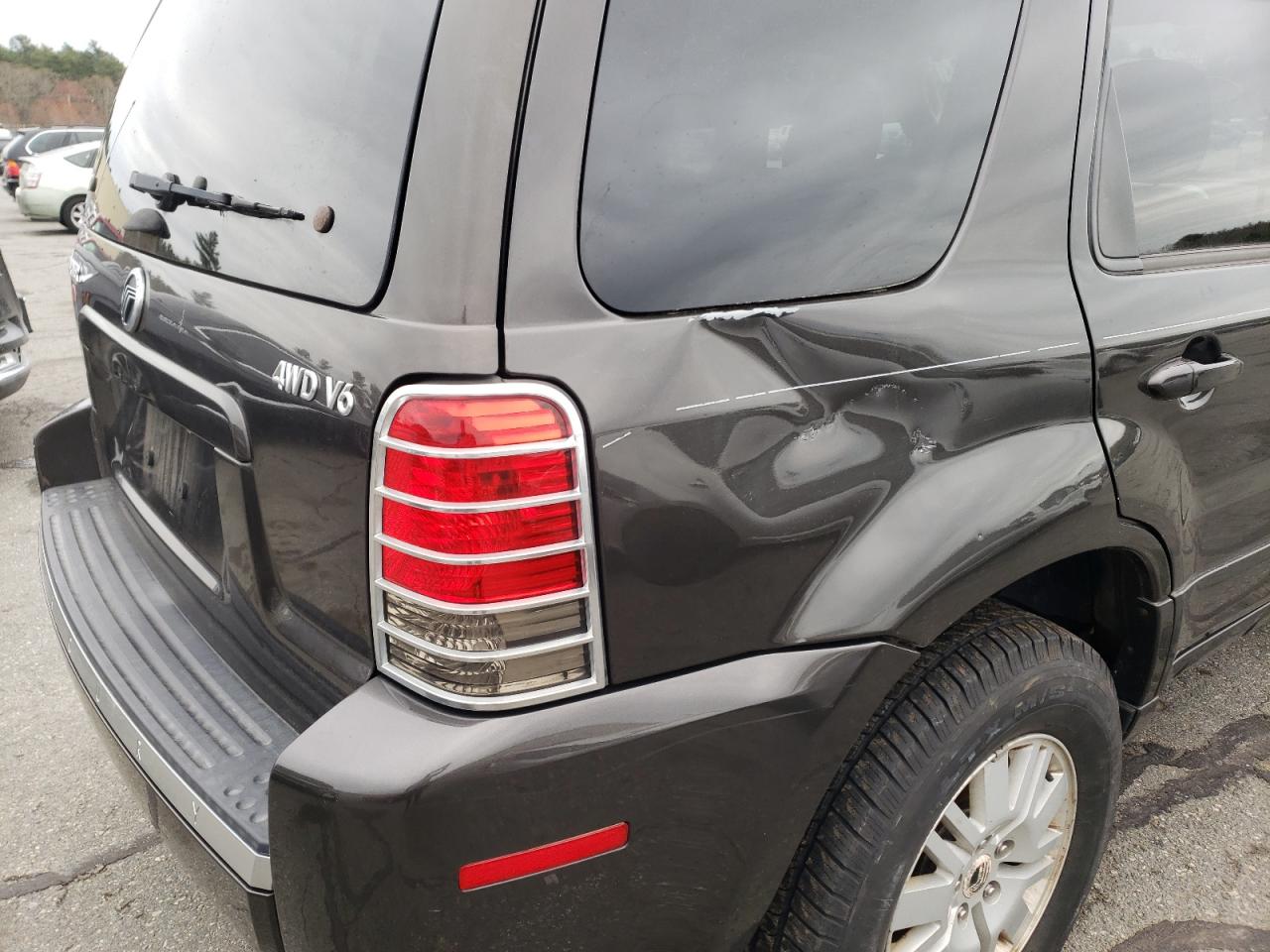 Photo 9 from auction – 2005 MERCURY MARINER with VIN 4M2YU571X5DJ04976