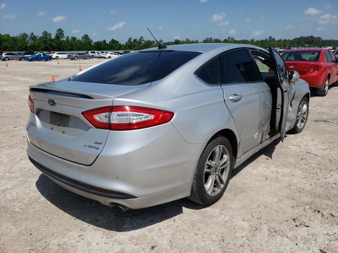 Photo 4 from auction – 2016 FORD FUSION HYB with VIN 3FA6P0LU9GR248123