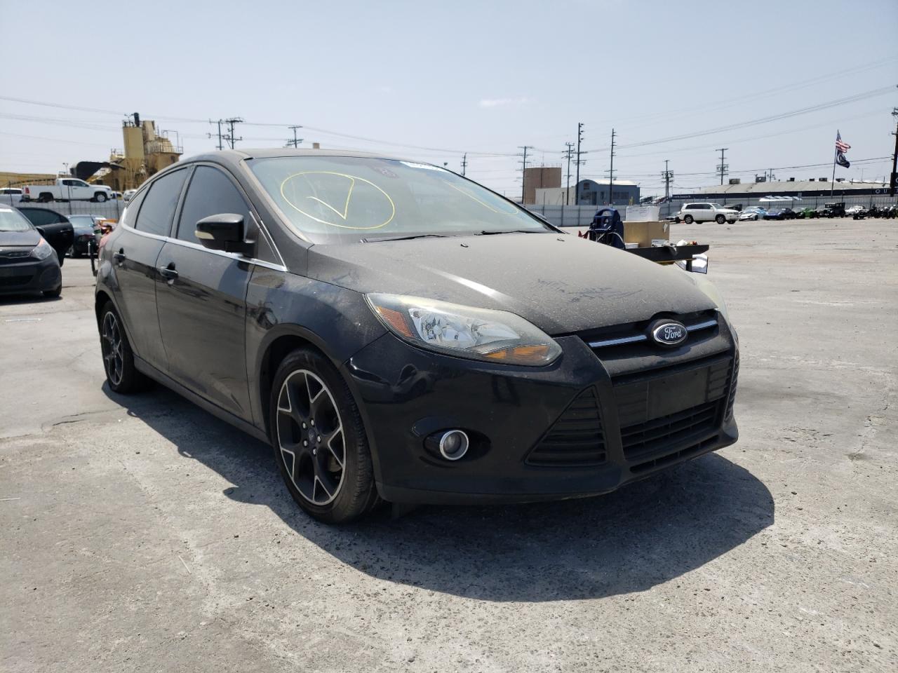 FORD FOCUS TITA 2012 with VIN 1FAHP3N29CL337303 - Photo from auction