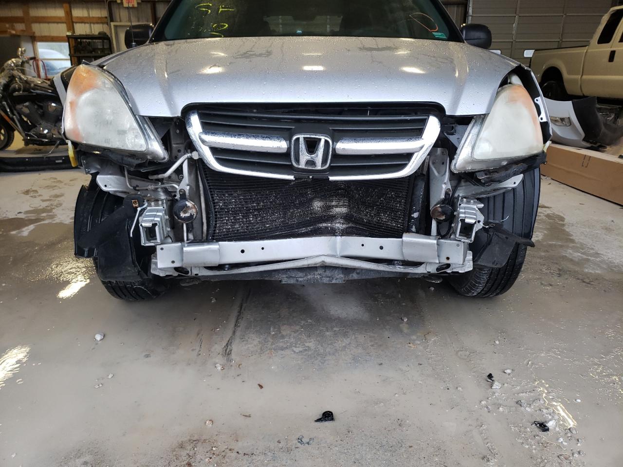 Photo 9 from auction – 2002 HONDA CR-V LX with VIN JHLRD68472C016724