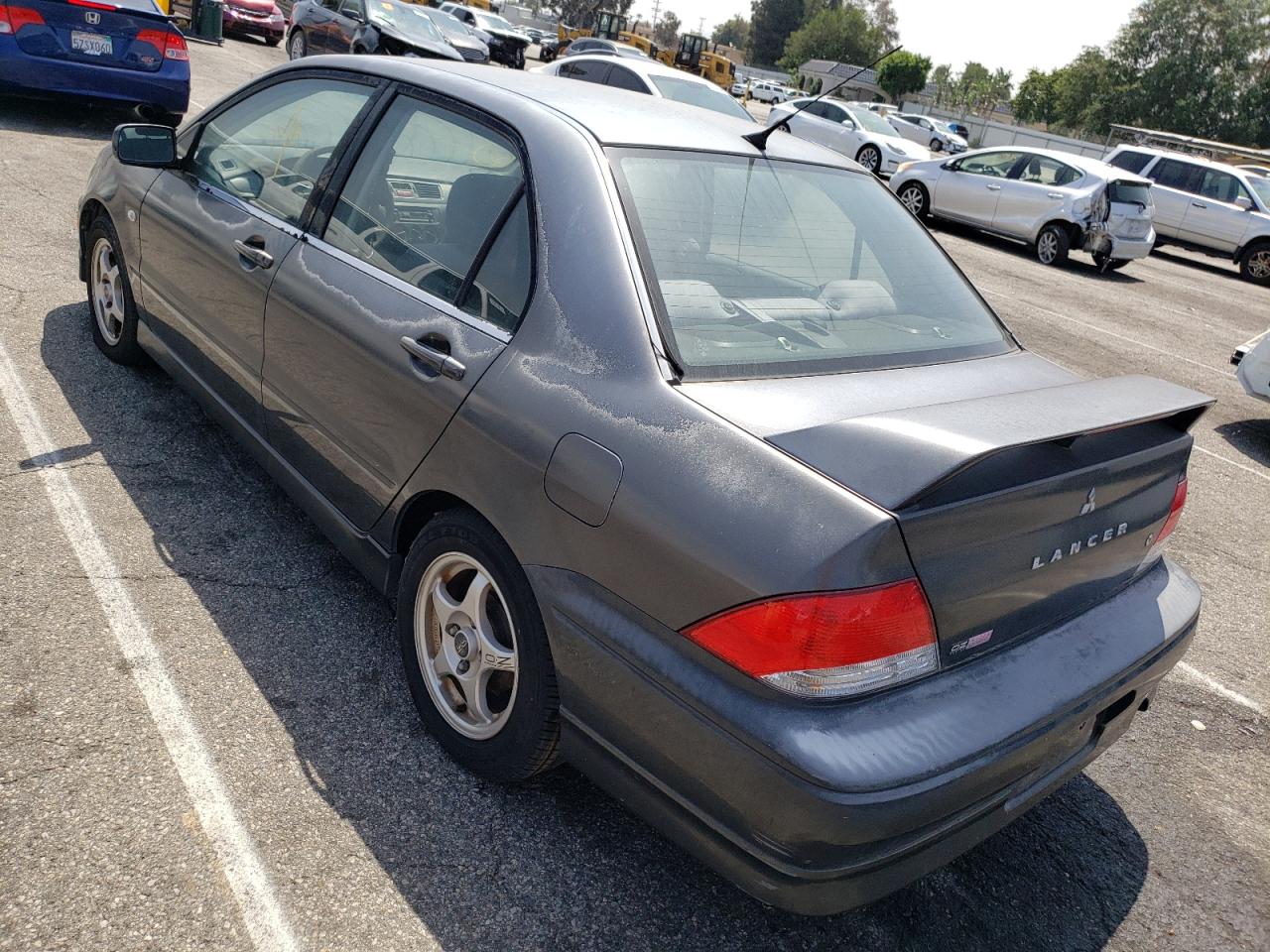 Photo 3 from auction – 2002 MITSUBISHI LANCER OZ with VIN JA3AJ86E12U065243