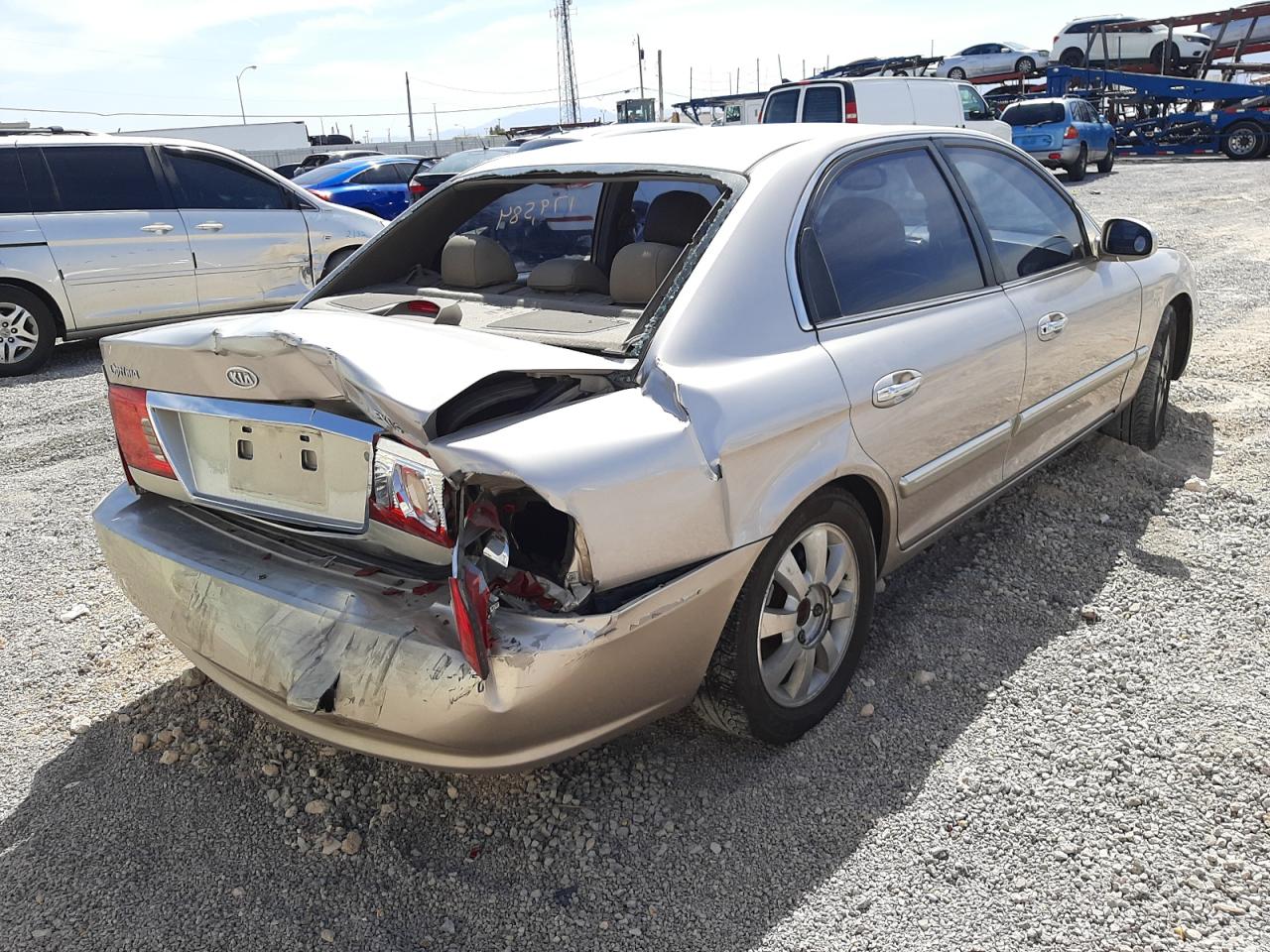 Photo 4 from auction – 2004 KIA OPTIMA LX with VIN KNAGD128245266119