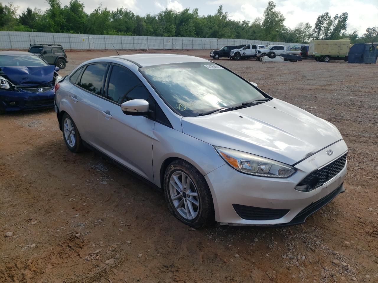FORD FOCUS 2016 with VIN 1FADP3F2XGL395147 - Photo from auction