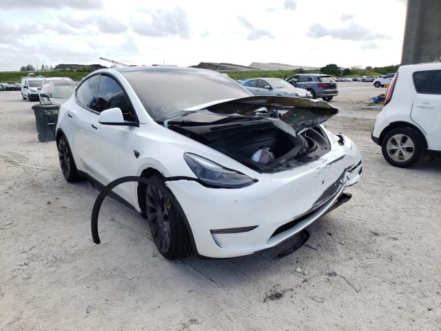 TESLA MODEL Y 2021 with VIN 5YJYGDEFXMF182767 - Photo from auction