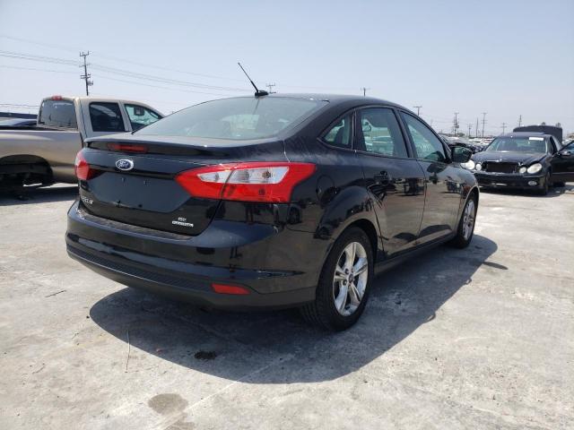 Foto 4 de la subasta – 2014 FORD FOCUS SE con VIN 1FADP3F20EL116849