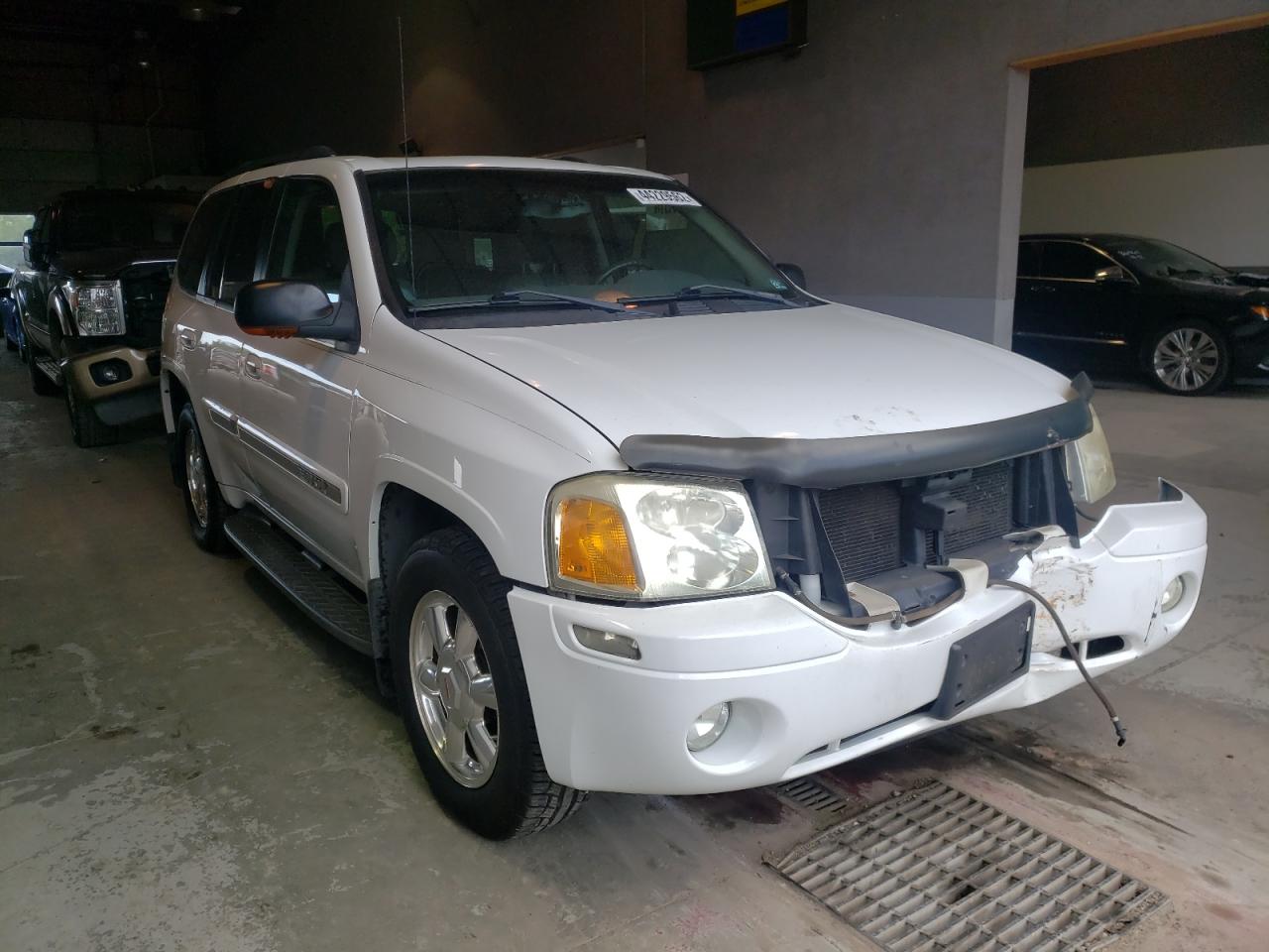 GMC ENVOY 2003 with VIN 1GKDT13S232235198 - Photo from auction