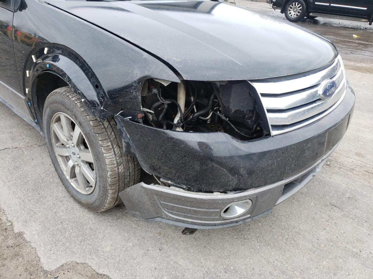 Photo 9 from auction – 2008 FORD TAURUS X S with VIN 1FMDK05W18GA44578