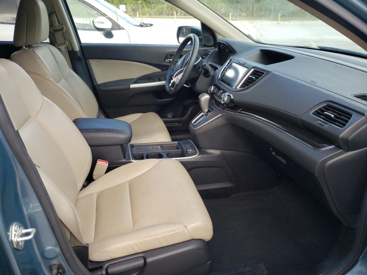 Photo 5 from auction – 2016 HONDA CR-V EXL with VIN 2HKRM3H70GH530612
