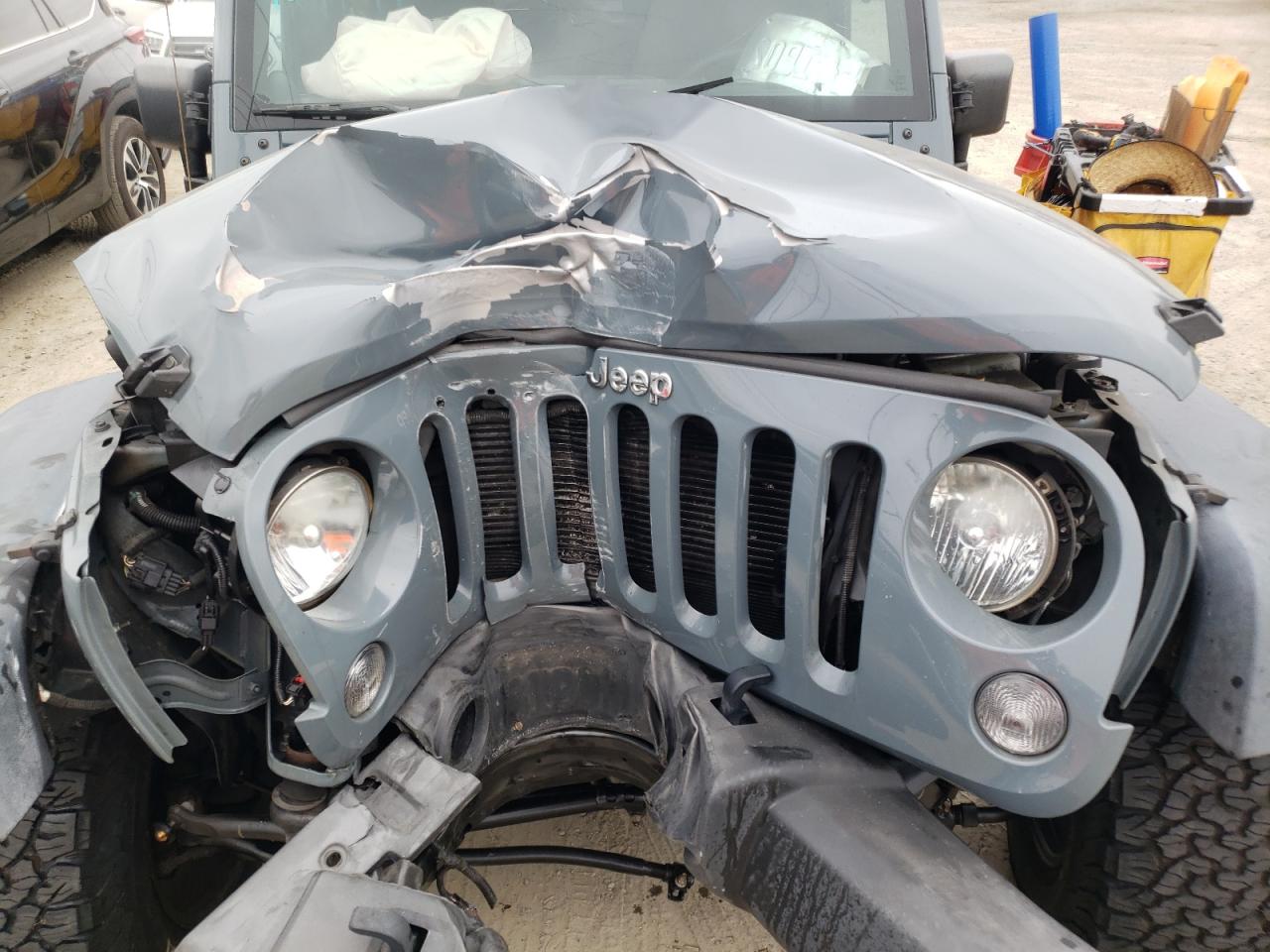 Photo 7 from auction – 2014 JEEP WRANGLER U with VIN 1C4BJWDG3EL312917